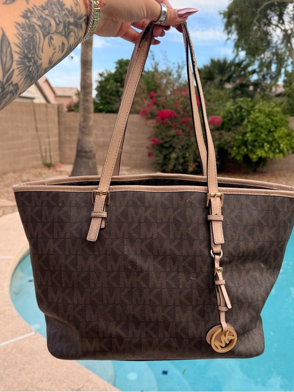 Michael Kors Brown Tote with Beige Trim and Gold Charm